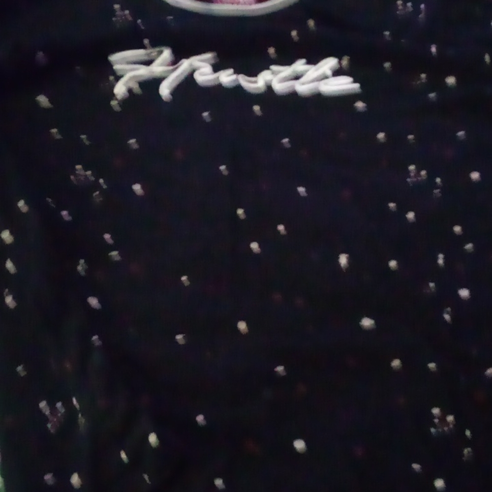 Prime shirt with hustle on front